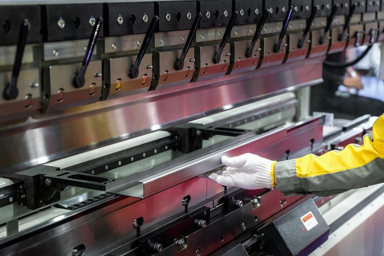 High-efficiency precision metal stamping production line at XLUIG modern manufacturing facility