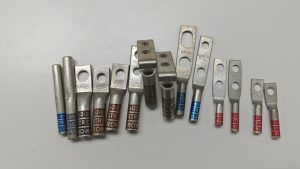 A comprehensive display of XLUIG T2 copper lugs and terminals with various surface treatments and sizes.