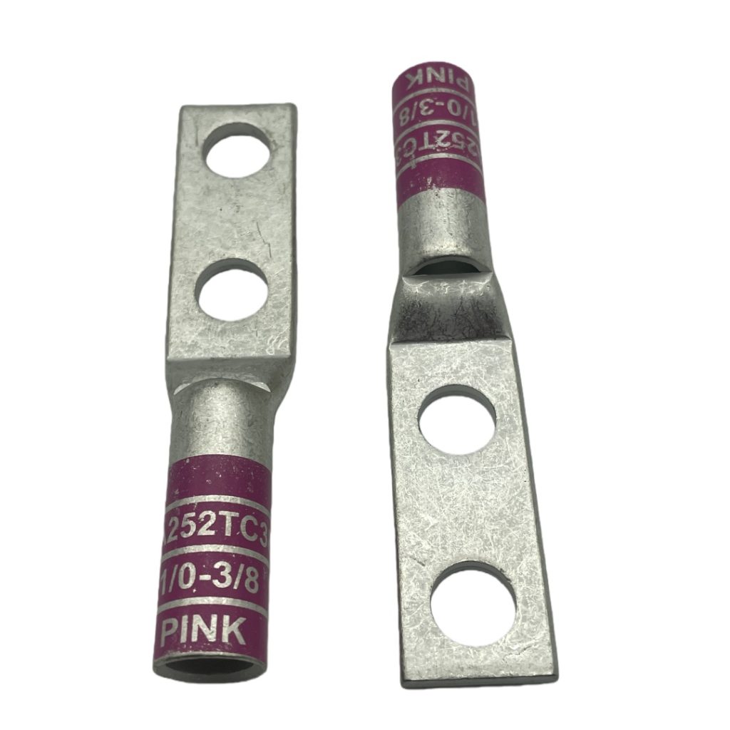 Close-up of the custom pink color code markings and inspection window on an XLUIG 1/0 AWG lug.